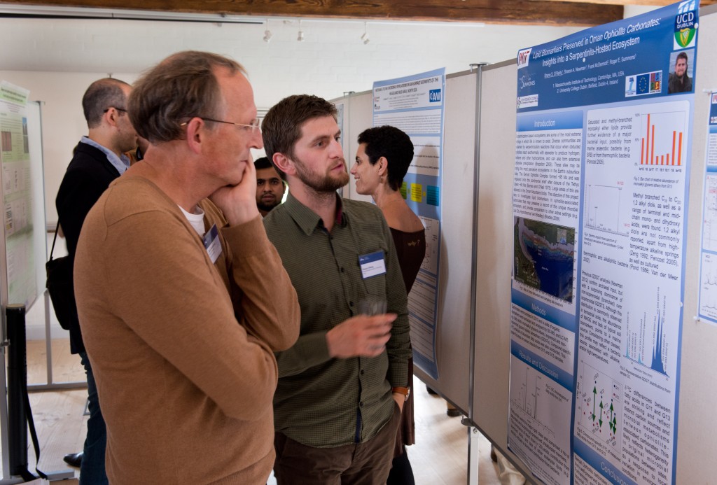 Shane discussing his poster with Prof. Jack Middelburg (Utrecht)